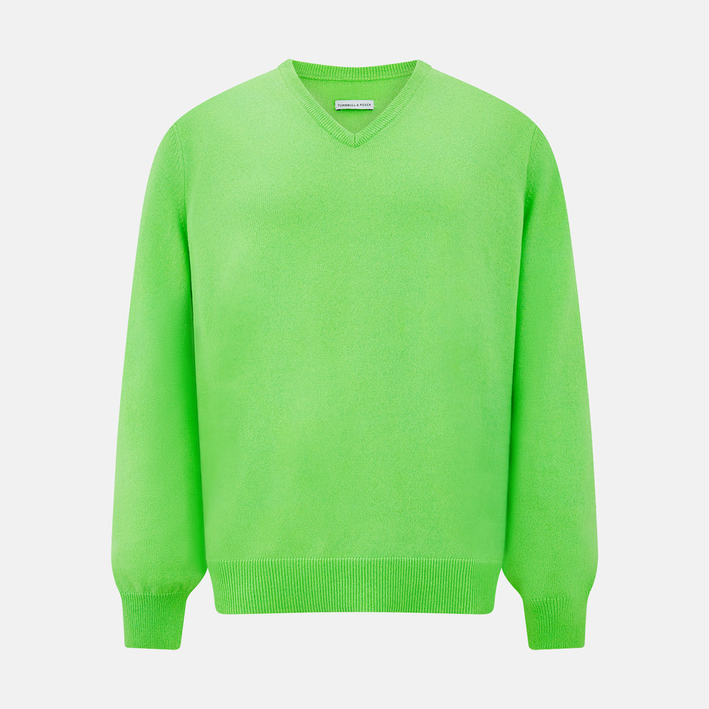The Turnbull & Asser Bright Green Cashmere V-Neck Jumper features long sleeves with ribbed cuffs and hem—a vibrant addition to your knitwear collection, shown on a plain white background.