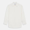 View 1 of product The Cream Silk Whitby Shirt by Turnbull & Asser features a pointed collar, buttoned front and cuffs, and long sleeves, shown in Whitby Fit and laid flat on a white background.