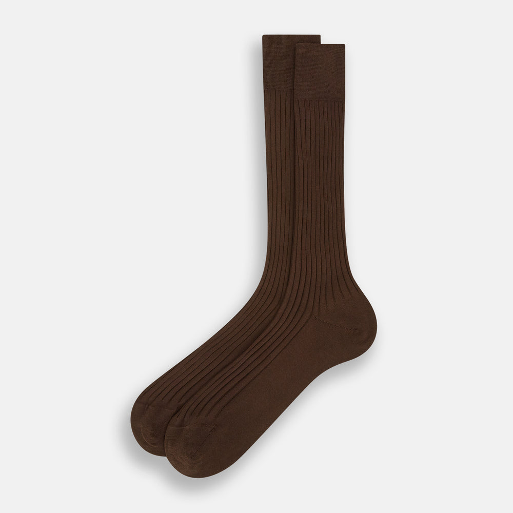 A single Coffee Organic Cotton Mid-Length Sock by Turnbull & Asser, featuring a ribbed texture and crafted from organic cotton, is displayed upright on a plain white background.