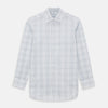 View 1 of product The Turnbull & Asser Blue and Grey Multi Check Mayfair Shirt features a T&A collar, cuffed long sleeves, and a light blue and gray plaid pattern on white.