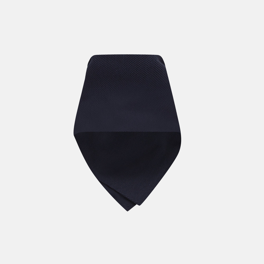 The Turnbull & Asser Navy Silk and Cotton Neck Warmer features a dark navy blue textured fabric and a single black button, shown against a plain light gray background.