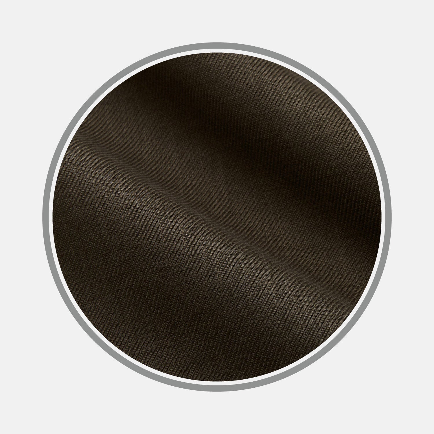 View 1 of product Close-up of Turnbull & Asser's Khaki Green Plain Linen Fabric, featuring a subtle diagonal ribbed texture, shown within a circular frame on a light gray background.