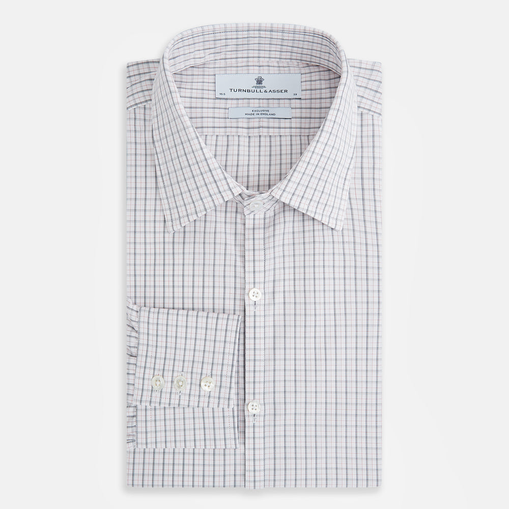 The Blue and Red Graph Check Westminster Shirt by Turnbull & Asser features a classic collar, long sleeves, and British craftsmanship, with a blue and red checkered pattern on white, displayed flat on a white surface.