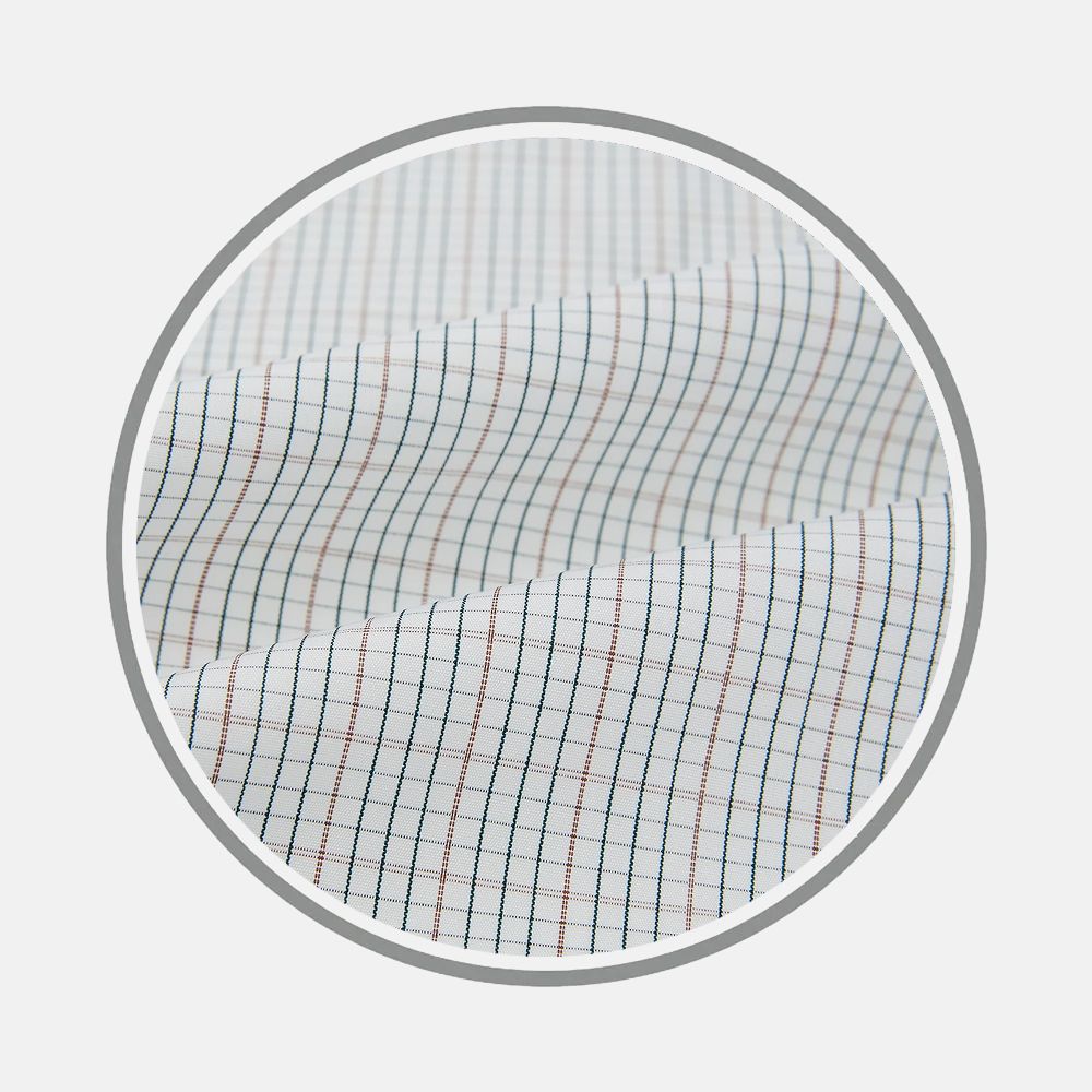 Close-up of Turnbull & Asser's Forest Melange and Red Micro Check Fabric, featuring a white background with thin blue and red grid lines, shown within a circular frame on a light grey backdrop.