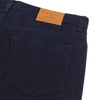 View 4 of product Turnbull & Asser Navy Moleskin Trousers featuring straight-leg design, front and back pockets, button closure, and belt loops, showcased on a plain white background.