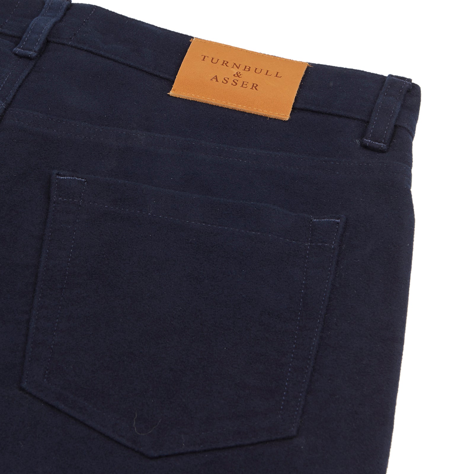 View 4 of product Turnbull & Asser Navy Moleskin Trousers featuring straight-leg design, front and back pockets, button closure, and belt loops, showcased on a plain white background.