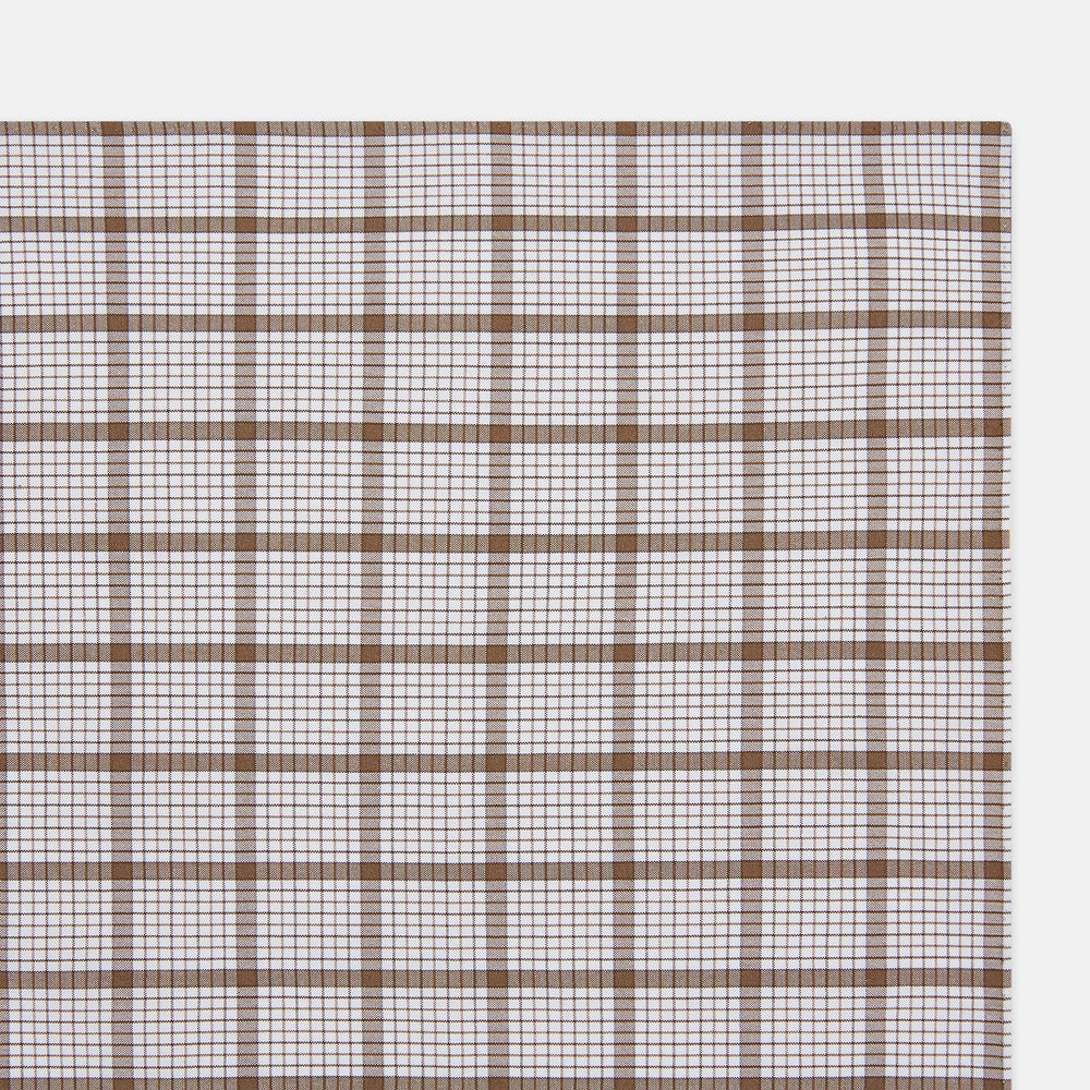 The Turnbull & Asser Hand Rolled Brown Overlay Check Handkerchief is a rectangular white cotton accessory with evenly spaced brown and black grid lines, forming squares—a timeless classic for gentlemen.