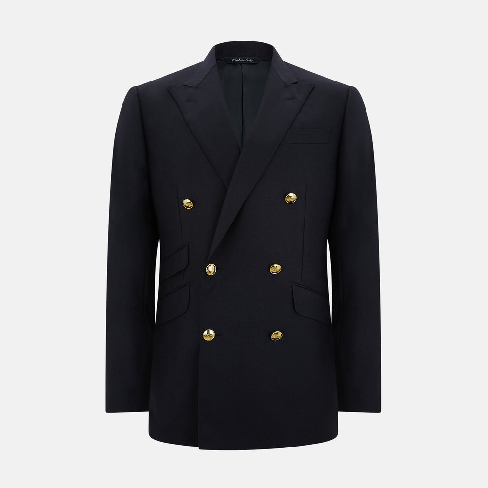 The Turnbull & Asser Long Navy Double Breasted Classic Blazer features peak lapels, six gold buttons, flap pockets, and a chest pocket—showcasing classic British tailoring against a plain light background.