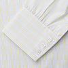 View 3 of product The Turnbull & Asser Yellow Multi Check Cotton Regular Fit Mayfair Shirt features a long-sleeved, button-up design with yellow and blue plaid, pointed collar, and buttoned cuffs, laid flat on a white background.
