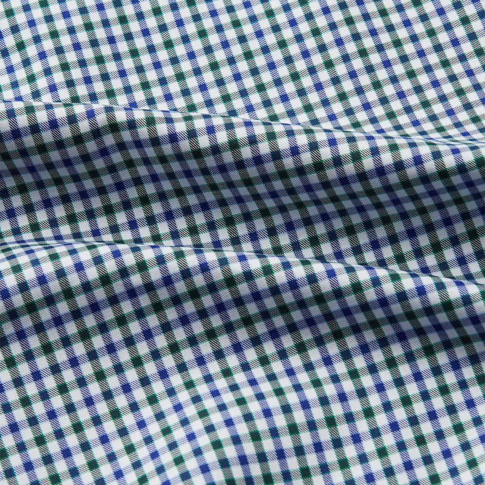 The Turnbull & Asser Green and Blue Cotton Multi Check Weekend Fit Finch Shirt features long sleeves, a pointed collar, and buttoned cuffs—perfect for versatile style. Laid flat on a white background.
