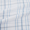 View 6 of product The Turnbull & Asser Blue and Grey Multi Check Mayfair Shirt features a T&A collar, cuffed long sleeves, and a light blue and gray plaid pattern on white.