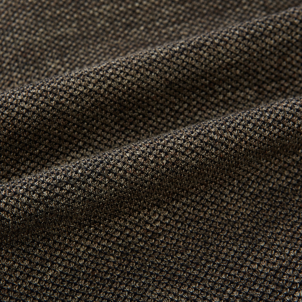 The Turnbull & Asser Pine Cone Linen Blend Cambridge blazer features a textured brown finish, notched lapel, two buttons, patch and chest pockets—showcasing classic British tailoring against a plain white background.