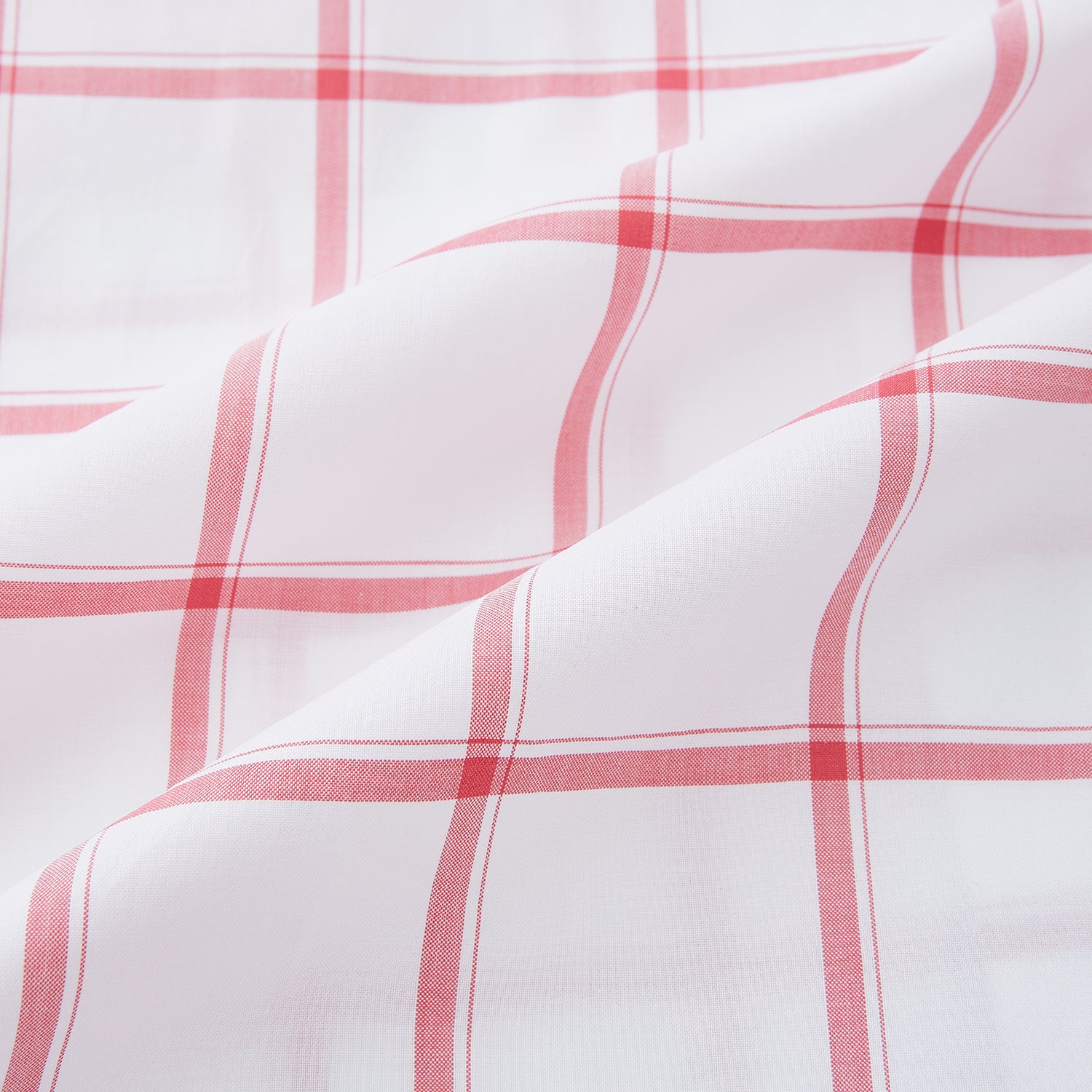 View 6 of product The Turnbull & Asser Coral Grid Check Mayfair Shirt is a white long-sleeve shirt with a collar, made from fine Italian cotton and featuring an evenly spaced coral grid check pattern.