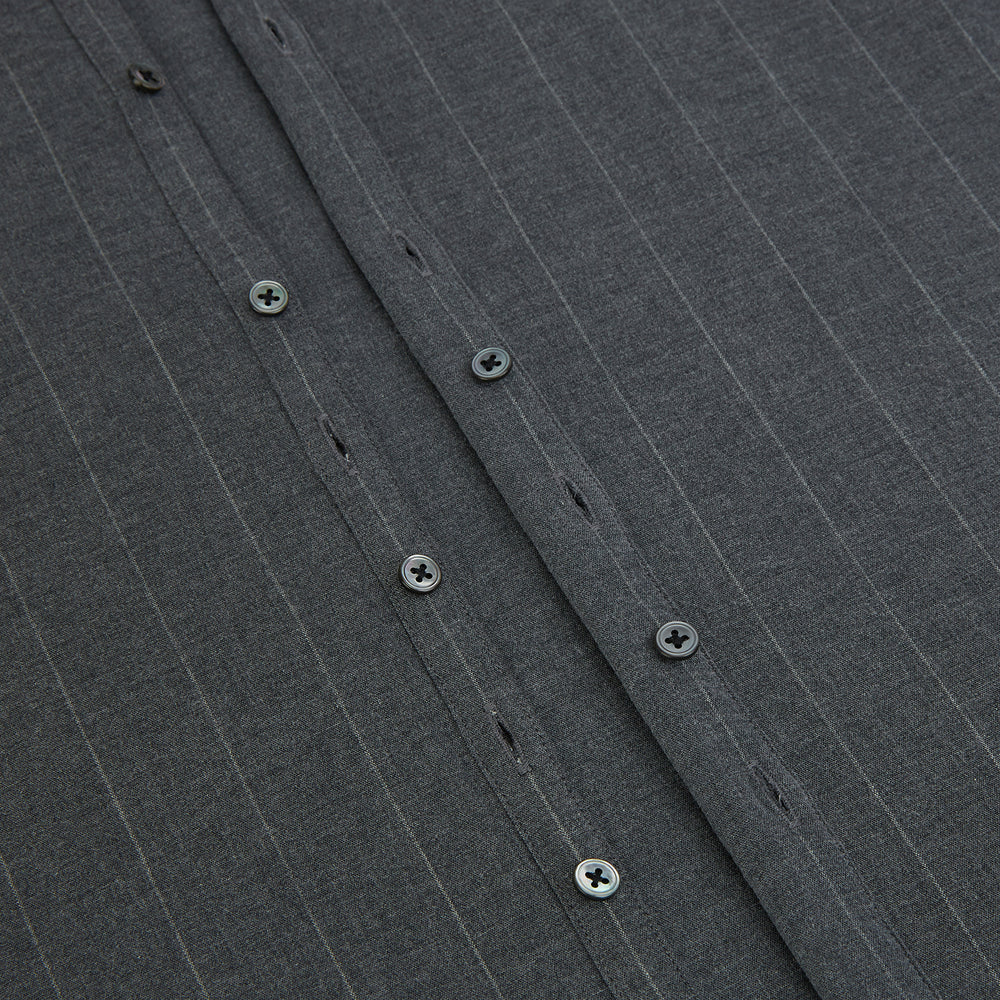 The Charcoal Melange Wide Stripe Westminster Shirt from Turnbull & Asser features long sleeves, a tailored fit, pointed collar, buttoned cuffs, and subtle wide stripes, shown laid flat on a white background.