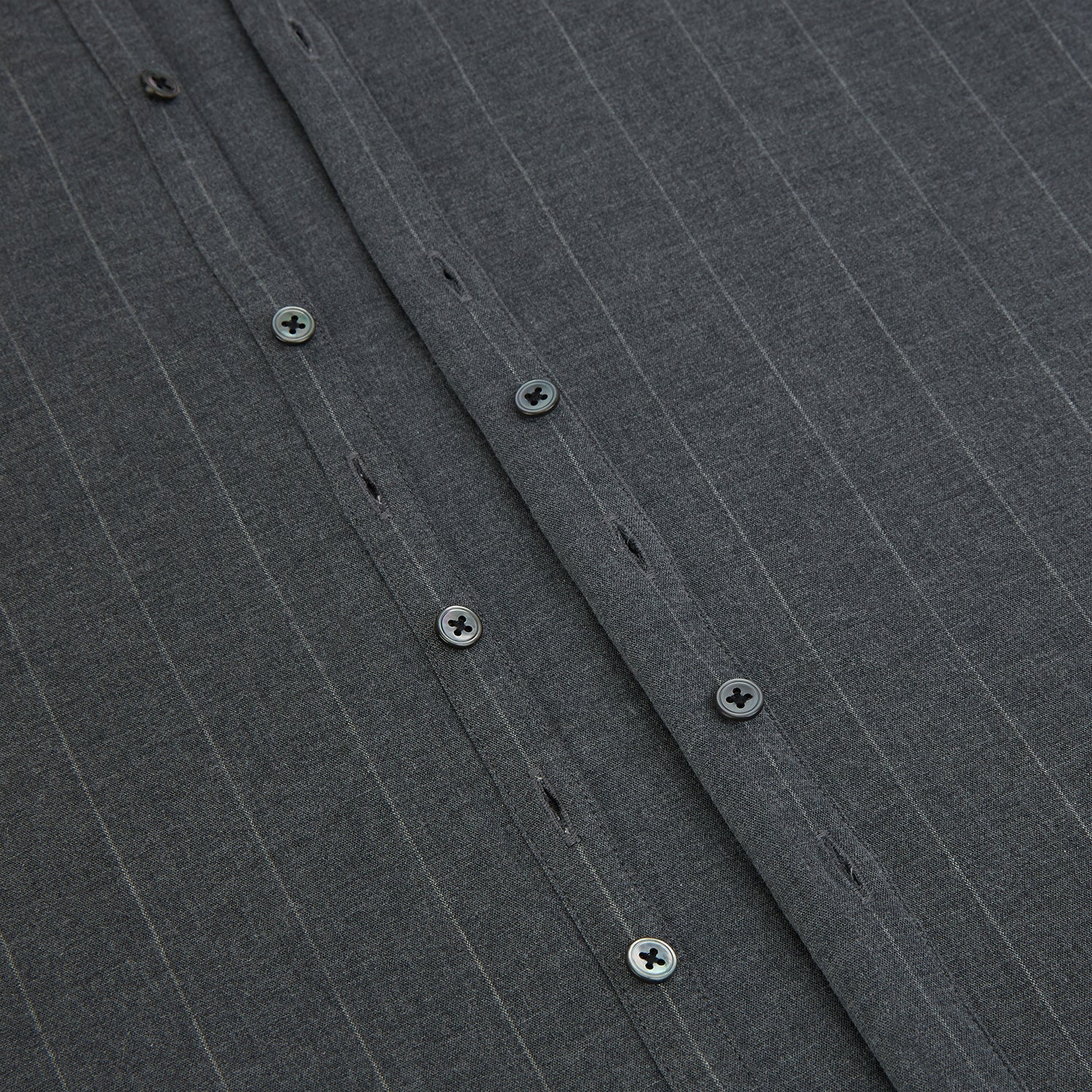 View 7 of product The Charcoal Melange Wide Stripe Westminster Shirt from Turnbull & Asser features long sleeves, a tailored fit, pointed collar, buttoned cuffs, and subtle wide stripes, shown laid flat on a white background.