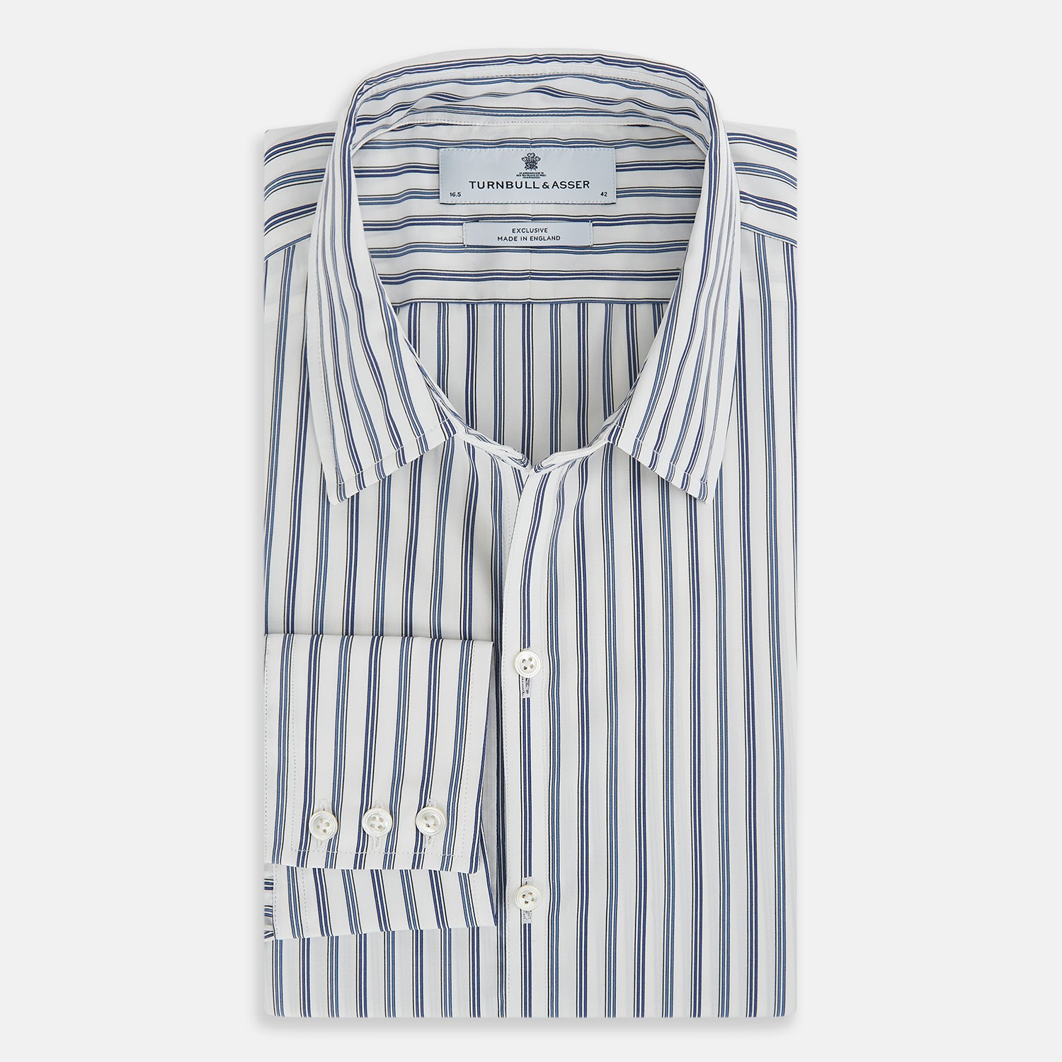 View 5 of product The SAPPHIRE BLUE MULTI TRACK STRIPE WINDSOR SHIRT by Turnbull & Asser features long sleeves, button-up front, classic collar, blue and white vertical stripes, buttoned cuffs, and showcases British craftsmanship on a white background.