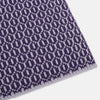 View 2 of product The Turnbull & Asser Purple and Lilac Hexagon Cashmere Knitted Scarf, featuring a white hexagon pattern, is neatly knotted and displayed on a plain background—a stylish accessory to elevate any outfit.