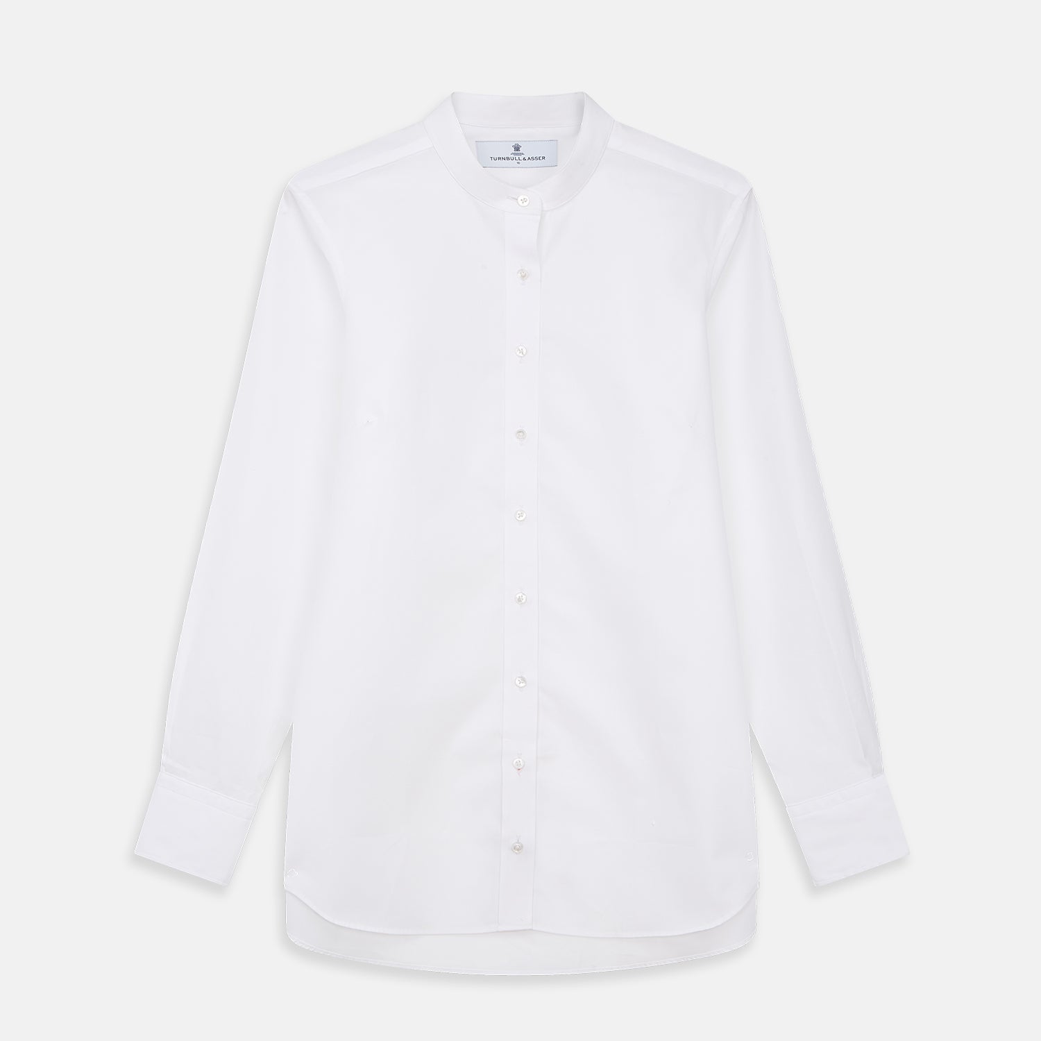 View 1 of product The White Cotton Lauren Shirt by Turnbull & Asser, featuring a stand collar, button-down front, and elongated body, is laid flat on a plain white background.