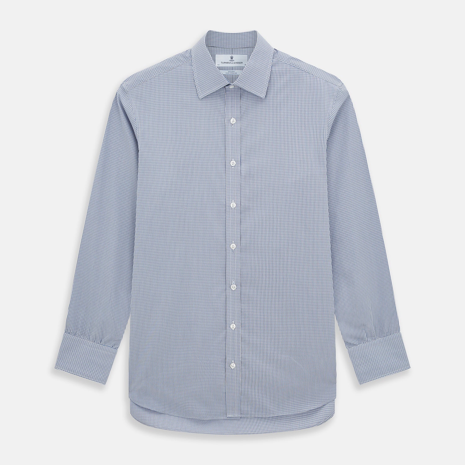 View 1 of product The Turnbull & Asser Pale Blue Micro Graph Check Mayfair Shirt features a small blue and white check pattern, classic T&A collar, white buttons, and buttoned cuffs. Presented on a plain white background.
