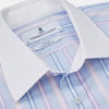 View 2 of product The Turnbull & Asser Light Blue Multi Stripe Cotton Regular Fit Penrose Shirt features light blue, white, and pink stripes with a crisp white collar and cuffs, displayed on a white background.