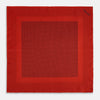 View 4 of product The Turnbull & Asser Red Dot Silk Pocket Square showcases small black dots on red silk, neatly folded to reveal both the front and part of the reverse side.