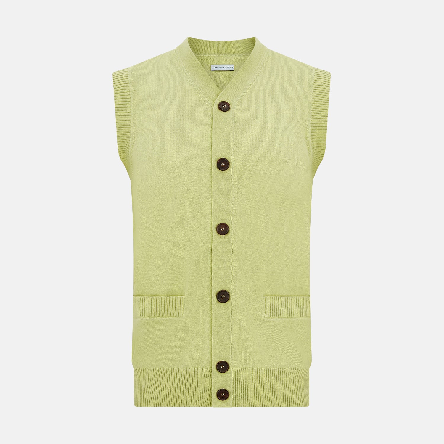 View 1 of product The Melon Green Sleeveless Cardigan by Turnbull & Asser features a ribbed collar, large brown buttons, and two front pockets—a stylish layering piece shown against a plain white background.