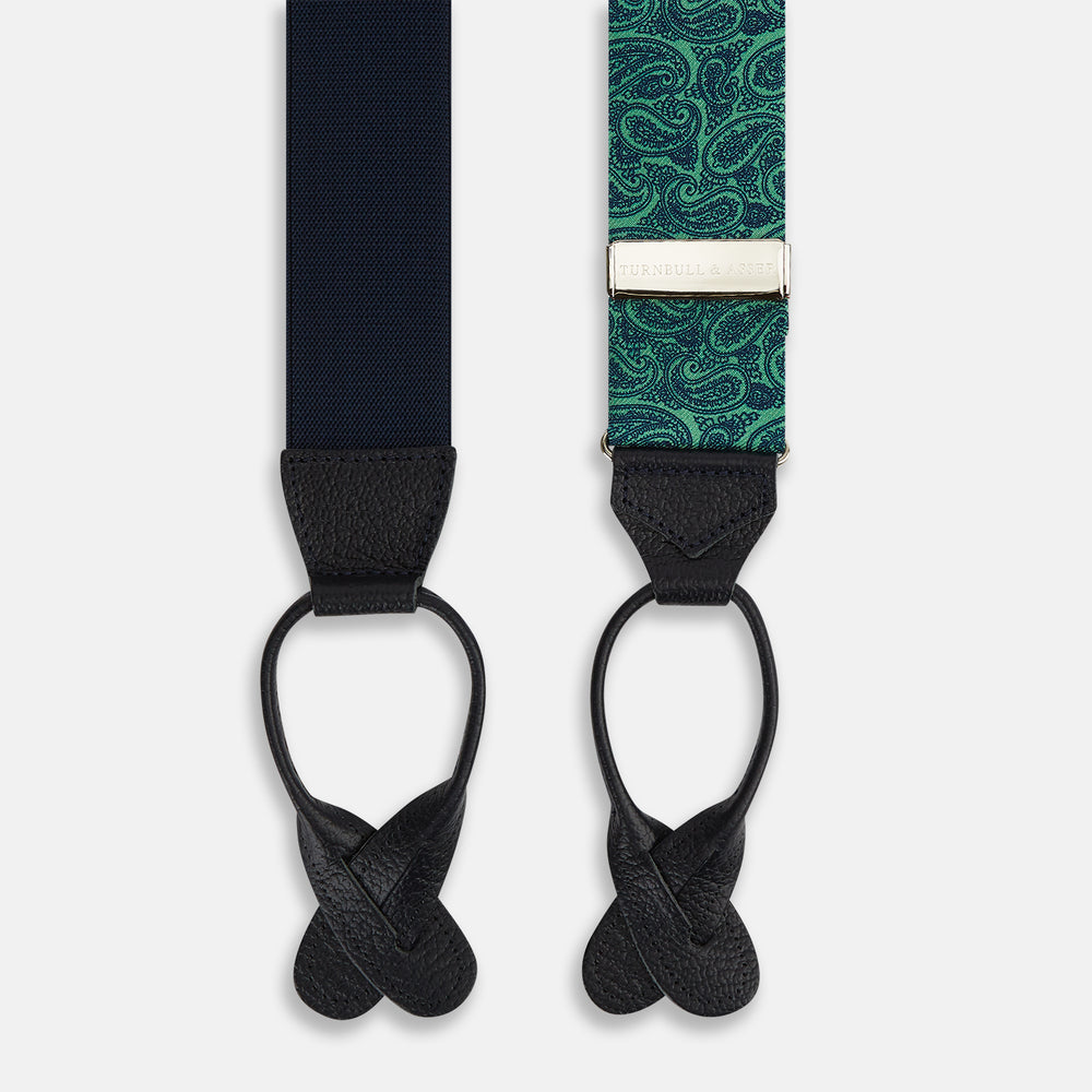 Turnbull & Asser's Kelly Green Paisley Adjustable Silk and Navy Leather Braces feature a bold paisley pattern, adjustable fit, and navy leather detailing. Shown flat on a white background—ideal for refined, elegant styling.