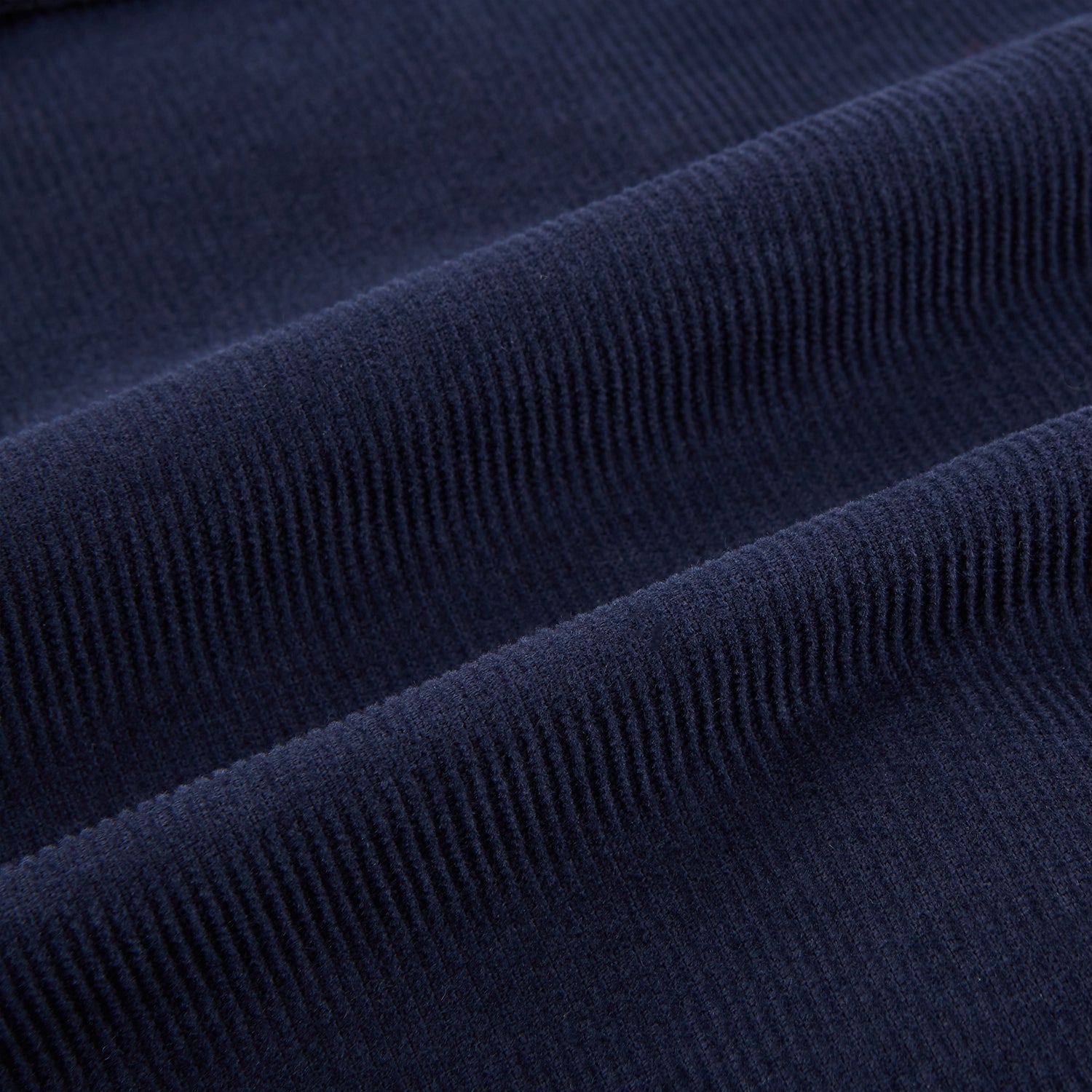 View 5 of product The Turnbull & Asser Light Navy Kingston Corduroy Caban Jacket features a double-breasted stretch cotton corduroy design with black buttons, notched collar, and long buttoned cuffs, displayed on a plain white background.