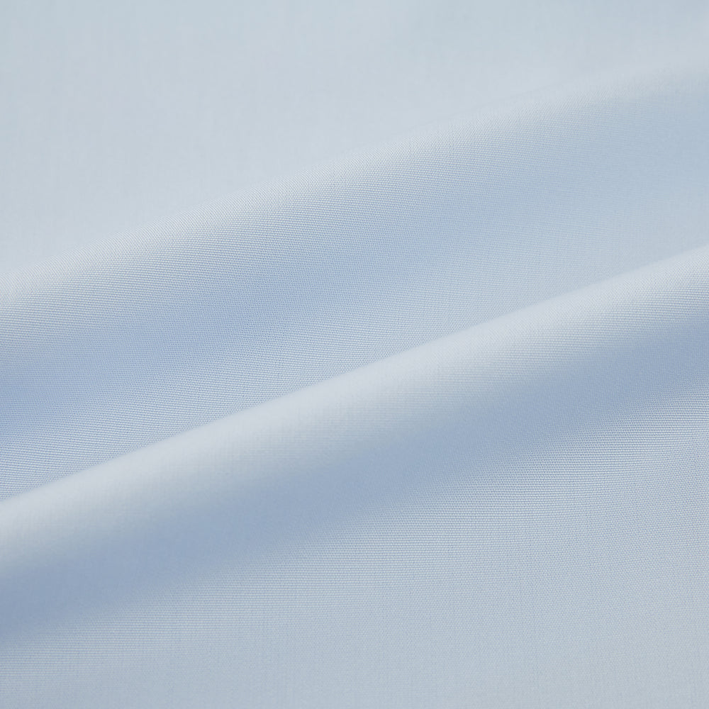 The Turnbull & Asser Pale Blue Cotton Regular Fit Mayfair Shirt features a classic collar, white buttons, and buttoned cuffs. This long-sleeve dress shirt displays the timeless Mayfair silhouette for a refined look.