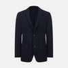 View 1 of product The Navy Knitted Oxford Blazer by Turnbull & Asser features notch lapels, two front buttons, a chest pocket, and two lower patch pockets, shown against a plain white background.