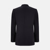 View 5 of product The Turnbull & Asser Long Navy Single Breasted Suit, shown on a white background, features a blazer with notch lapels and matching tailored trousers—ideal for formal occasions.