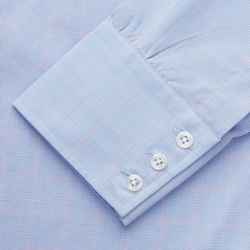 A Blue and Red Prince of Wales Check Mayfair Shirt by Turnbull & Asser, featuring long sleeves, a spread collar, buttoned cuffs, and button-up front, is laid flat on a white background.