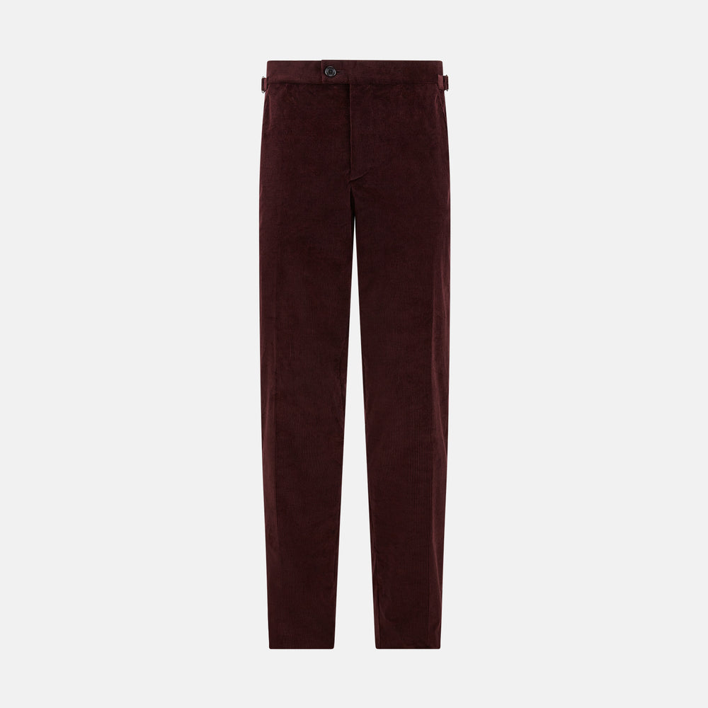 The Turnbull & Asser Burgundy Corduroy Henry Trousers feature a straight-leg cut, button and zip closure, and adjustable side tabs—perfect for refined formalwear—shown here on a plain white background.