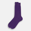 View 2 of product A single Purple Mid-Length Sock by Turnbull & Asser stands upright against a white background, highlighting its refined ribbed texture in solid dark purple mercerised Egyptian cotton.