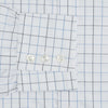 View 4 of product The Blue Grid Check Mayfair Shirt by Turnbull & Asser is a long-sleeve, button-up shirt with a T&A collar, crafted from organic cotton in a light and dark blue grid pattern, shown flat against a white background.