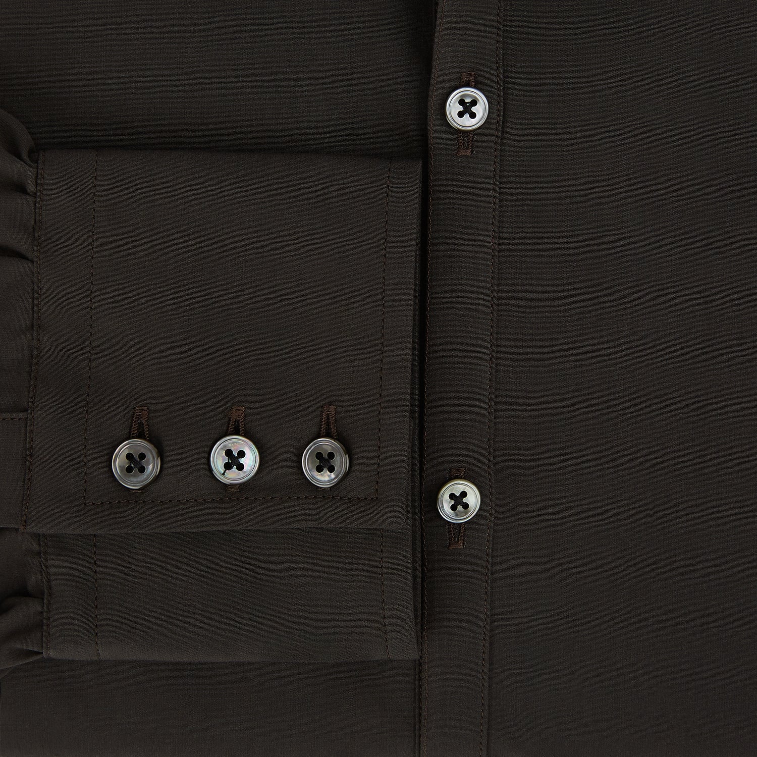 View 4 of product A brown Windsor long-sleeve button-up shirt by Turnbull & Asser with a classic collar, buttoned cuffs, and a straight hem, laid flat on a white background—showcasing refined British craftsmanship.