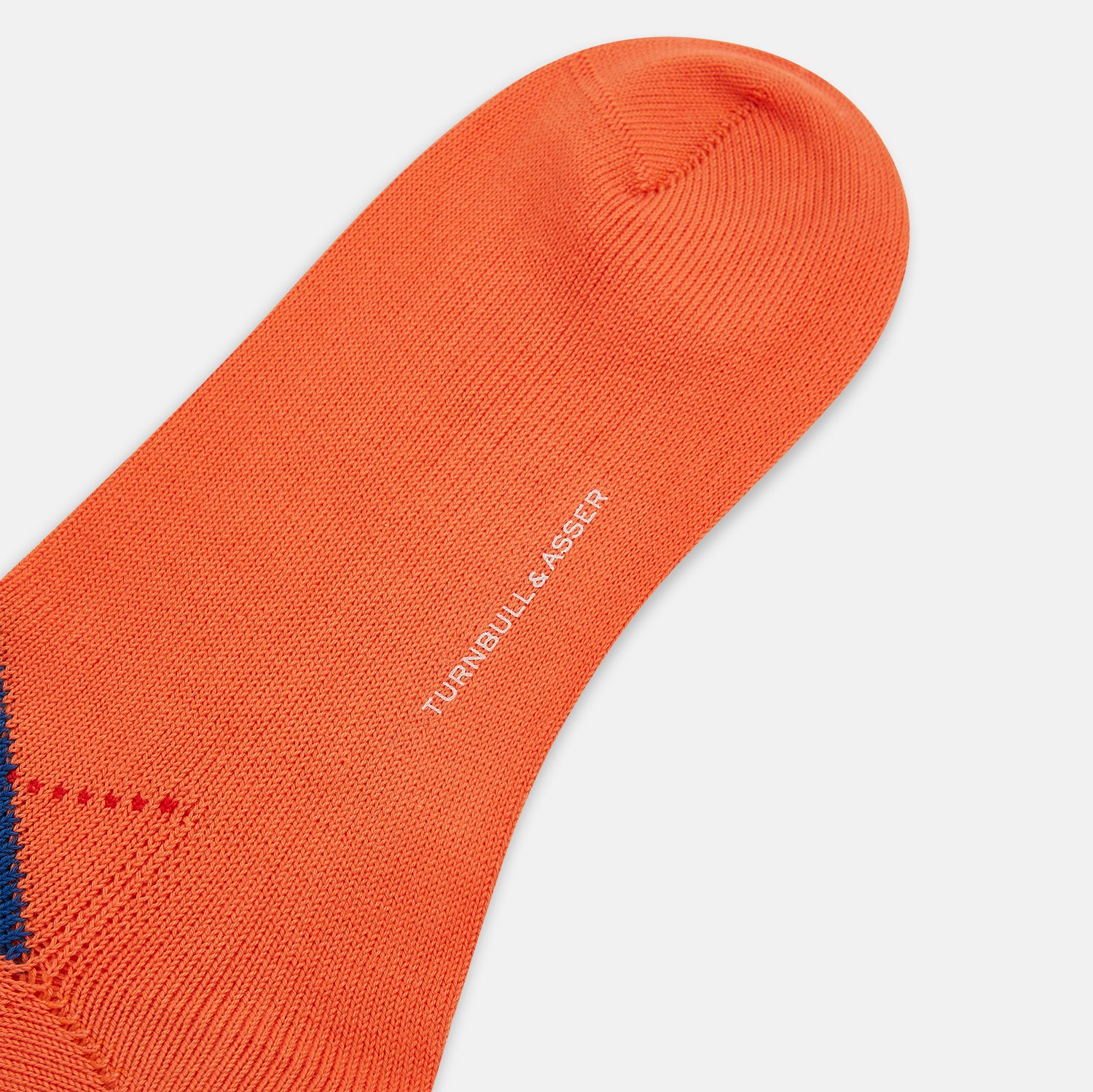 View 3 of product Turnbull & Asser's Royal Blue and Orange Patterned Mid-Length Socks feature an argyle design with brown, blue, and orange diamonds, shown against a plain white background.