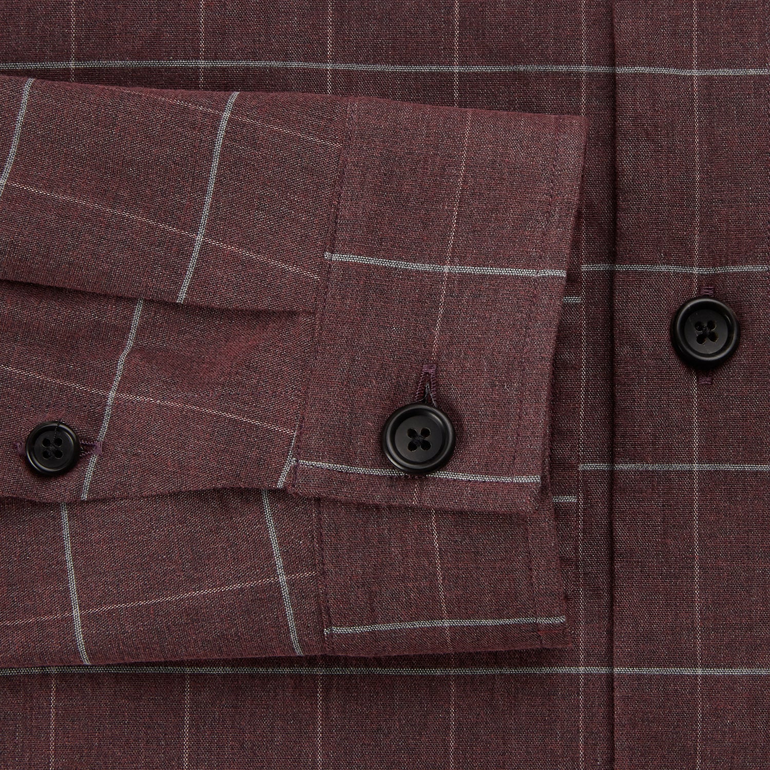View 4 of product The Turnbull & Asser Burgundy Check Hampstead Overshirt, featuring a button-up front, collar, white windowpane pattern, and two front pockets, is laid flat on a white background—perfect for elegant formal wear.