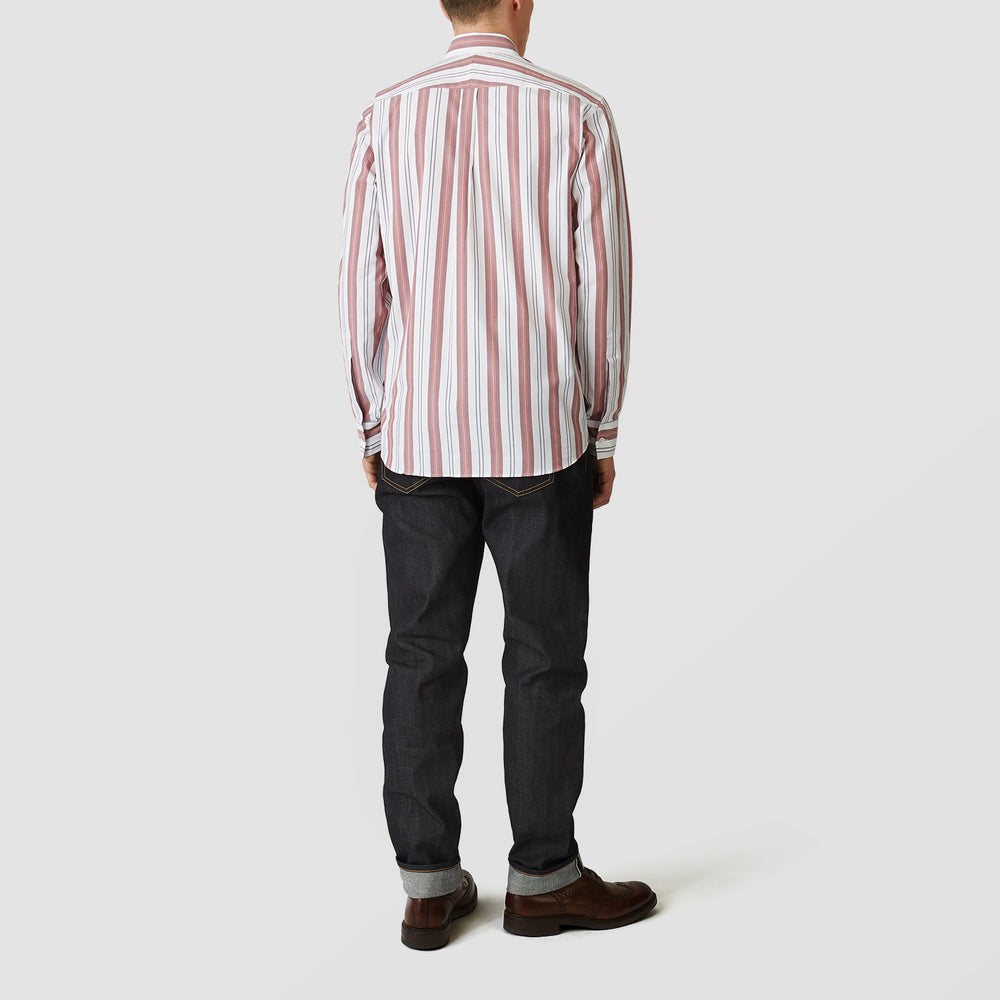 The Turnbull & Asser Red, Blue & White Stripe Weekend Fit Shirt features a Derby collar, 1-button cuffs, and crisp stripes—ideal for stylish winter layering.