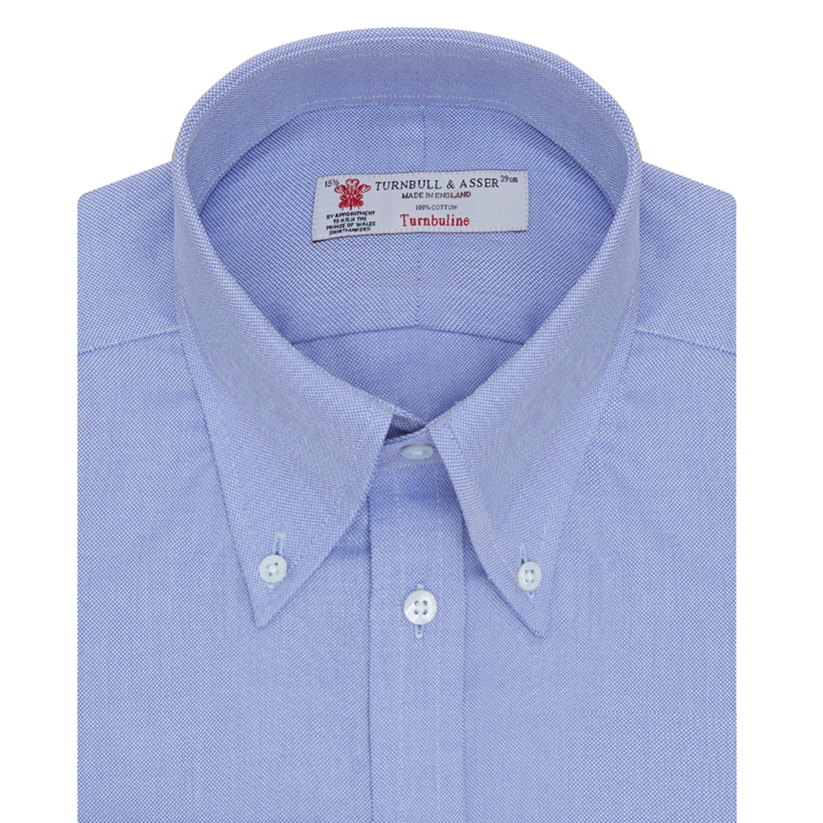 View 6 of product The Turnbull & Asser Blue Royal Oxford Cotton Shirt features a button-down collar, 3-button cuffs, and a visible brand label, shown neatly folded on a white background—ideal for pairing with a navy suit.