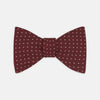 View 1 of product The Turnbull & Asser Burgundy and White Small Spot Printed Silk Bow Tie is shown on a plain white background.
