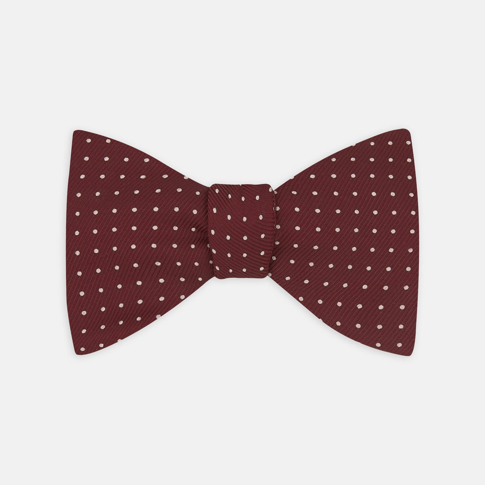 The Turnbull & Asser Burgundy and White Small Spot Printed Silk Bow Tie is shown on a plain white background.
