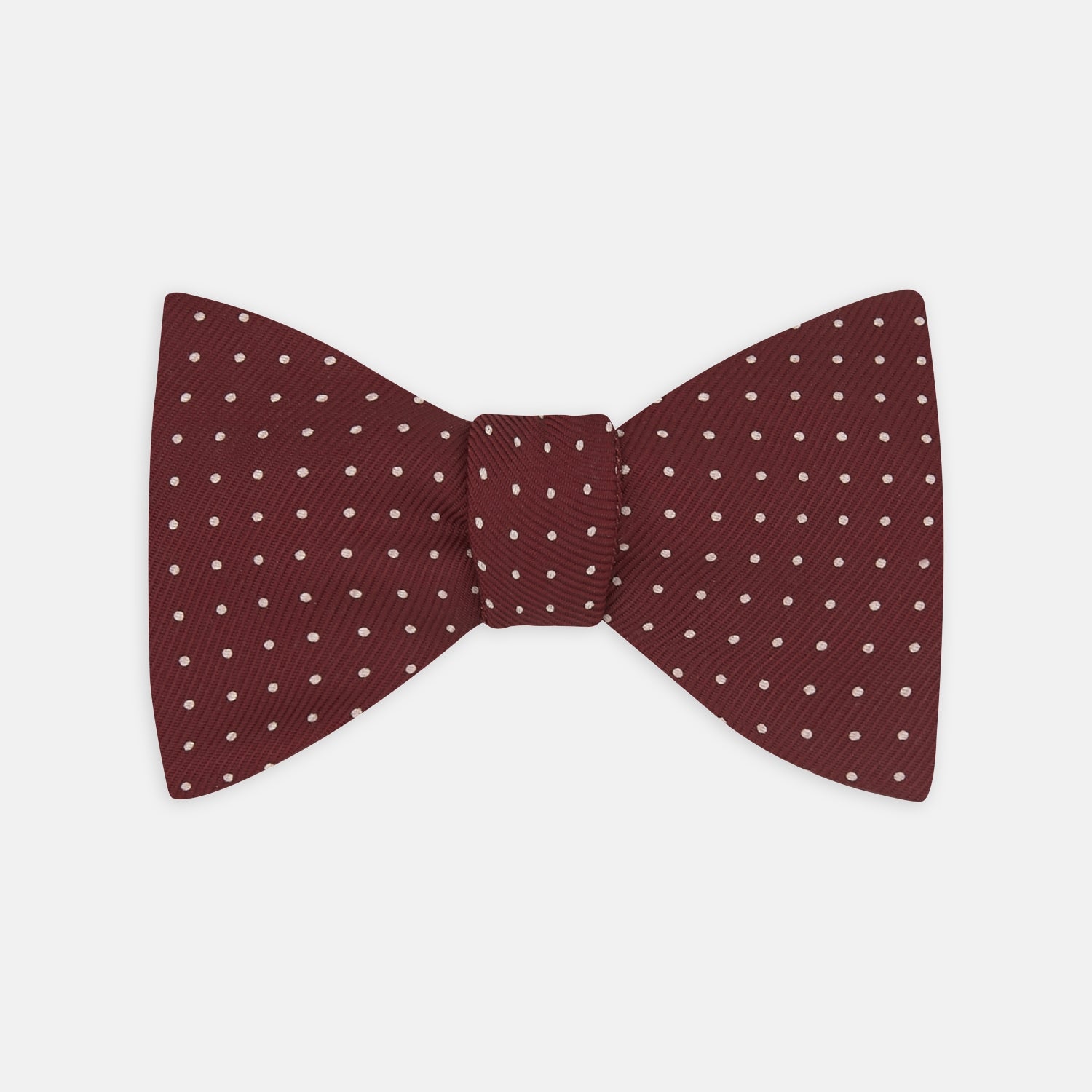 View 1 of product The Turnbull & Asser Burgundy and White Small Spot Printed Silk Bow Tie is shown on a plain white background.