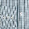 View 4 of product The Turnbull & Asser Light Petrol Micro Tattersall Check Mayfair Shirt features long sleeves, a classic collar, buttoned cuffs, and is crafted from Italian cotton in a refined blue and white check pattern.