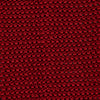 View 3 of product The Turnbull & Asser KNITTED RED SILK PLAIN TIE, featuring a textured finish, is rolled up and displayed against a plain white background.