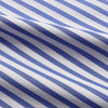 View 12 of product The Turnbull & Asser Pale Blue Candy Stripe Cotton Marlene Shirt is an oversized women's collared shirt with long sleeves, buttoned cuffs, and vertical blue and white stripes, shown laid flat on a white background.
