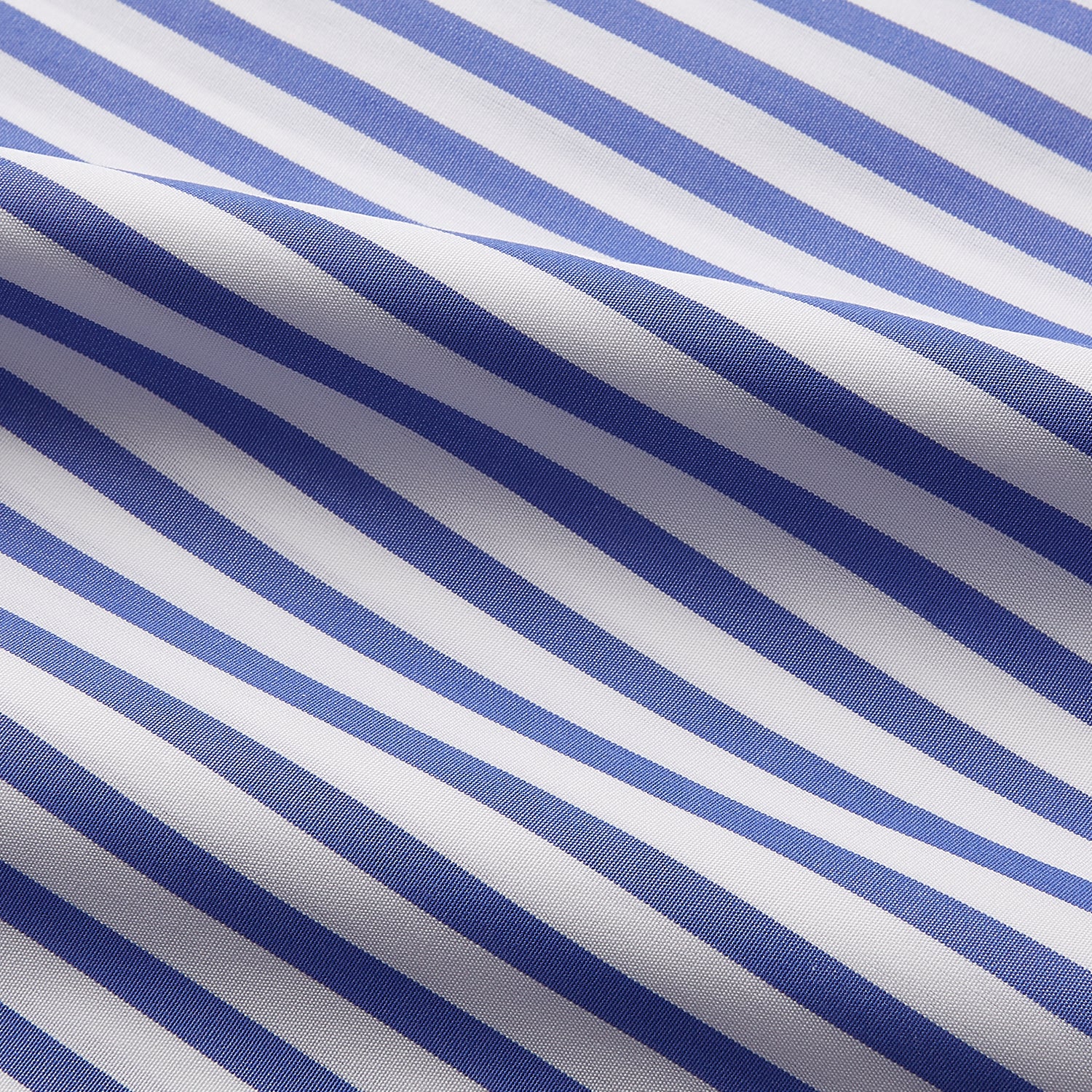 View 12 of product The Turnbull & Asser Pale Blue Candy Stripe Cotton Marlene Shirt is an oversized women's collared shirt with long sleeves, buttoned cuffs, and vertical blue and white stripes, shown laid flat on a white background.