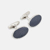 View 1 of product Turnbull & Asser's Navy Dotted Oval Cufflinks feature a silver finish and small white dots—ideal for adding a refined touch to any formal outfit. Shown here against a white background.