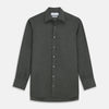 View 1 of product The Turnbull & Asser Dark Green Cotton Melange Regular Fit Mayfair Shirt features long sleeves, a T&A collar, buttoned cuffs, and a slightly rounded hem, shown laid flat on a white background.