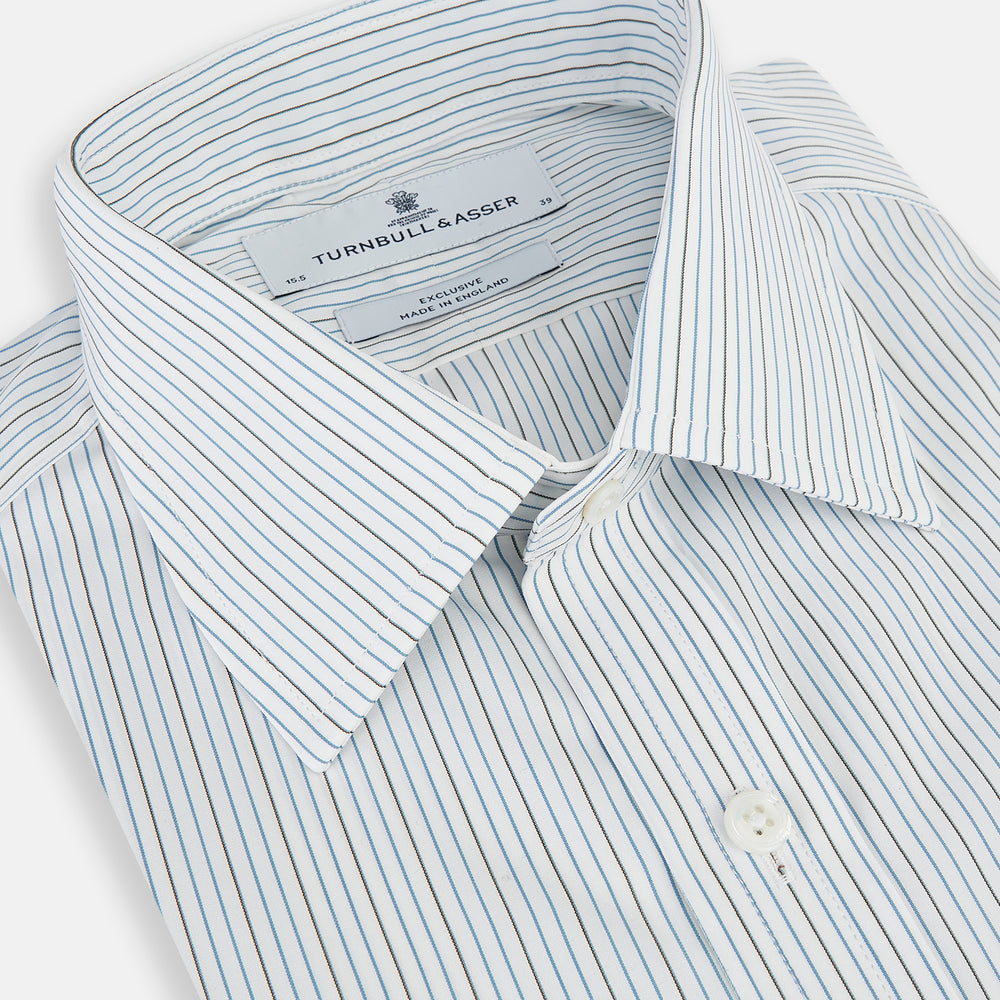 The Navy and Brown Pinstripe Mayfair Shirt by Turnbull & Asser, crafted from Italian cotton with long sleeves, a collar, and buttoned cuffs, is displayed on a plain white background.